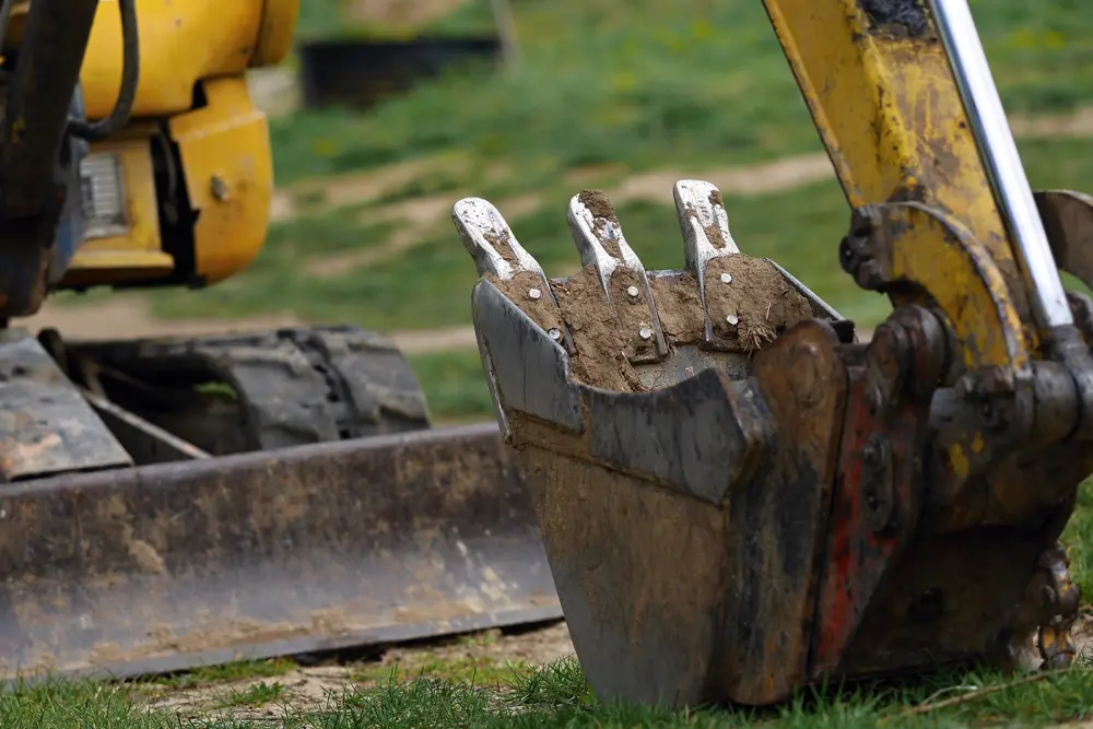Helena MT excavation contractor backhoe bucket digging at construction site