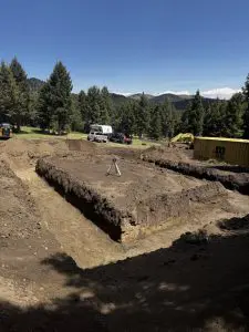 Excavation crew preparing a construction site in Bozeman, Montana