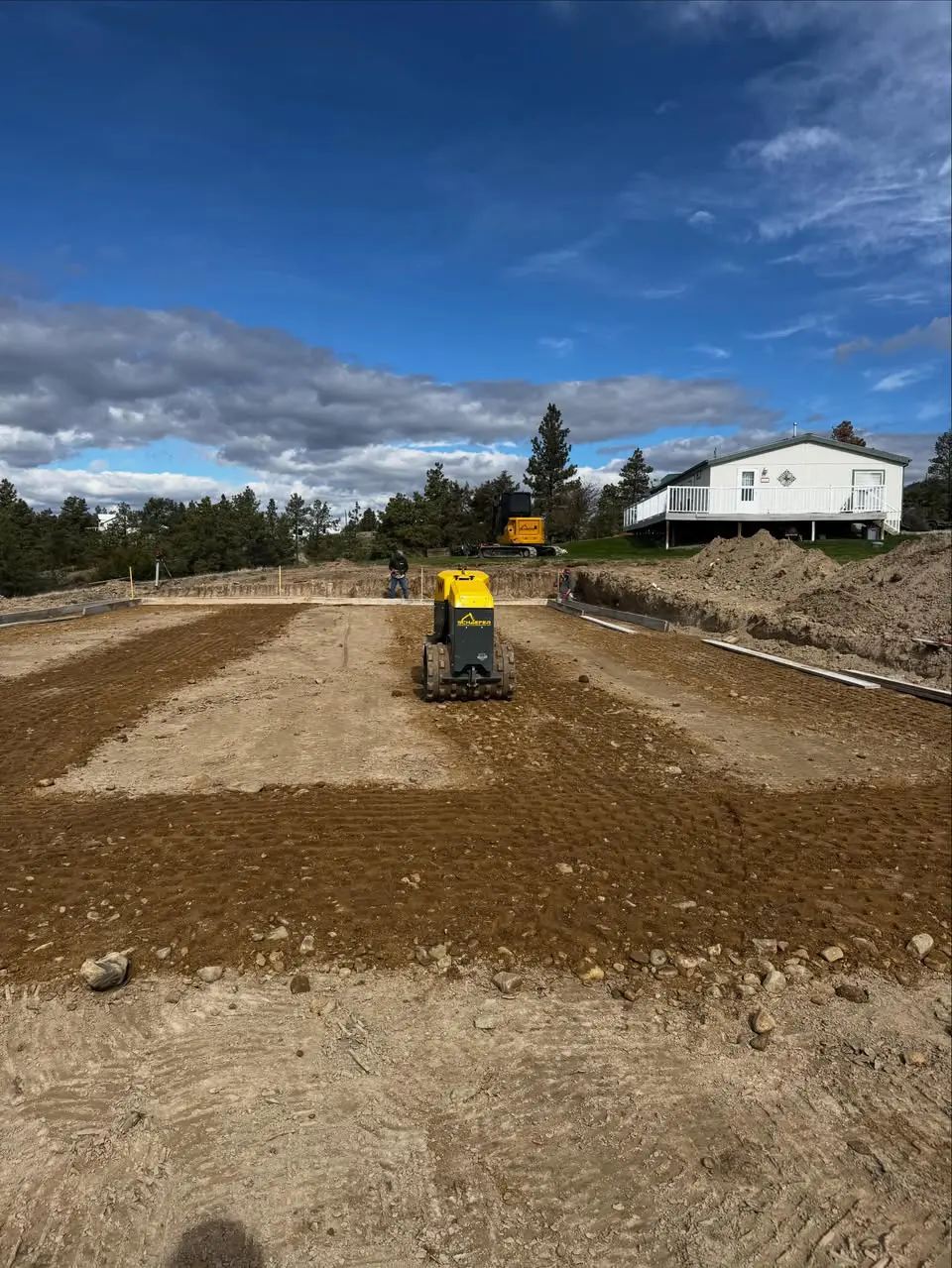 Excavating Butte MT building pad grading and compaction by Schaefer Excavating