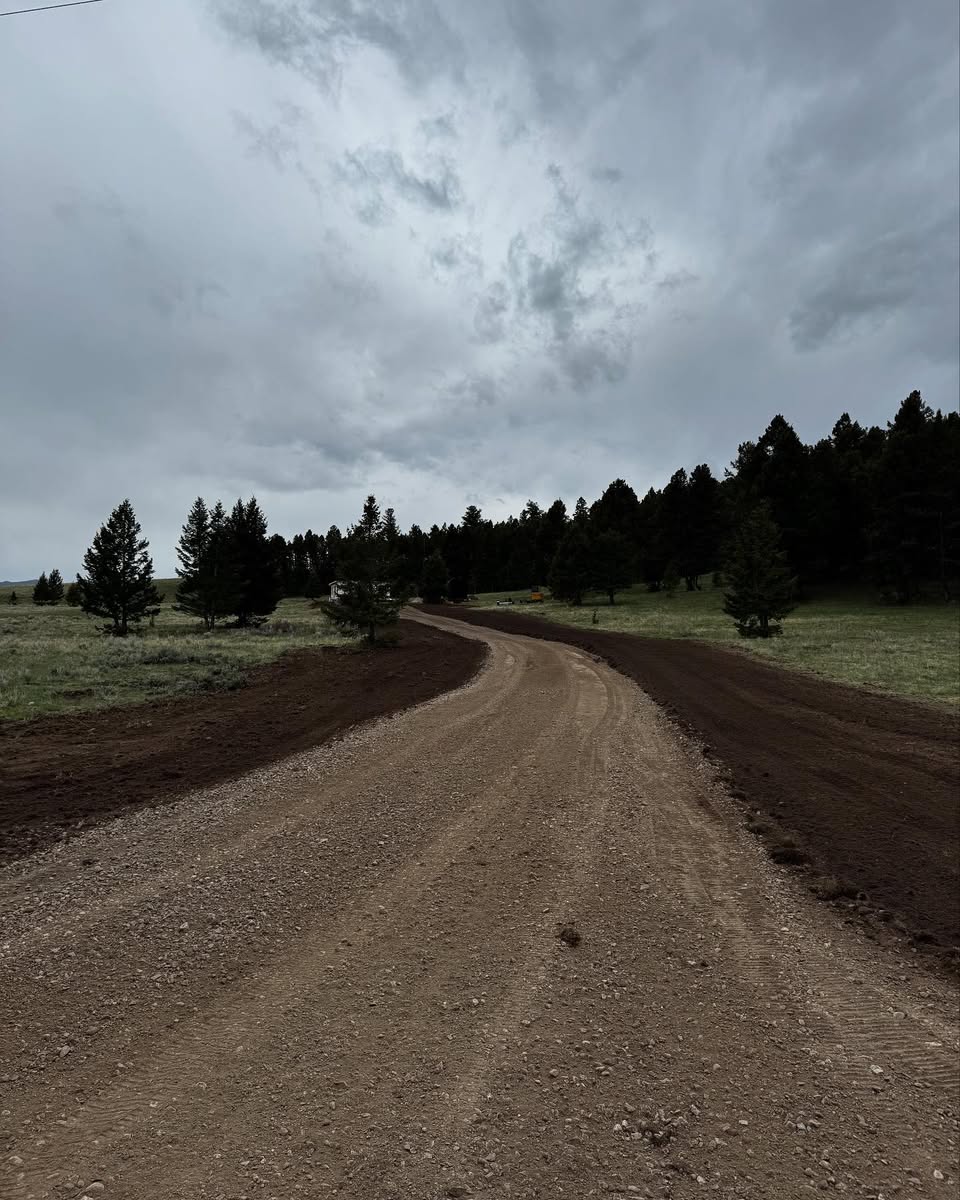 Road grading in progress by Schaefer Excavating in Helena, MT using heavy equipment
