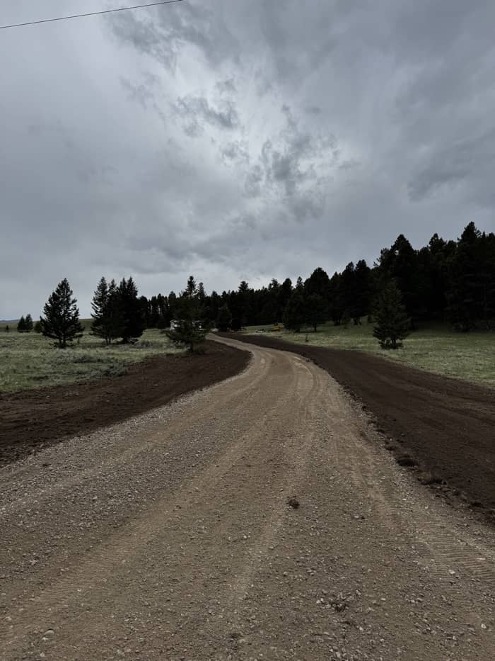 Excavation work for new residential driveway installation in Montana