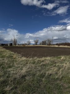 Completed site prep with leveled ground and graded surface in Montana